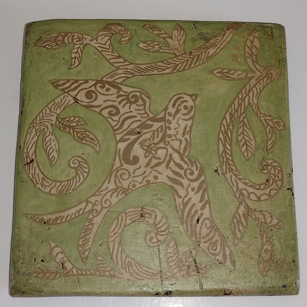 Kate McRostie hand-painted tile wall hanging with bird in sage green